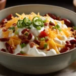 Red chili bowl with toppings